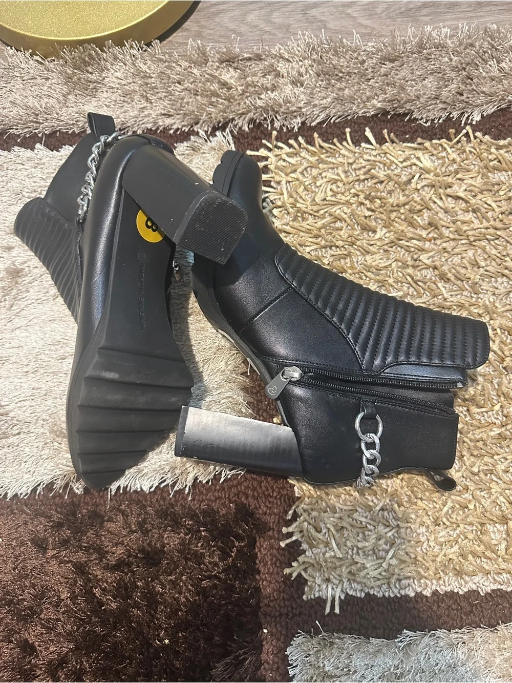 Adrienne Vittadini Black Quilted Ankle Boots with Chain Accent